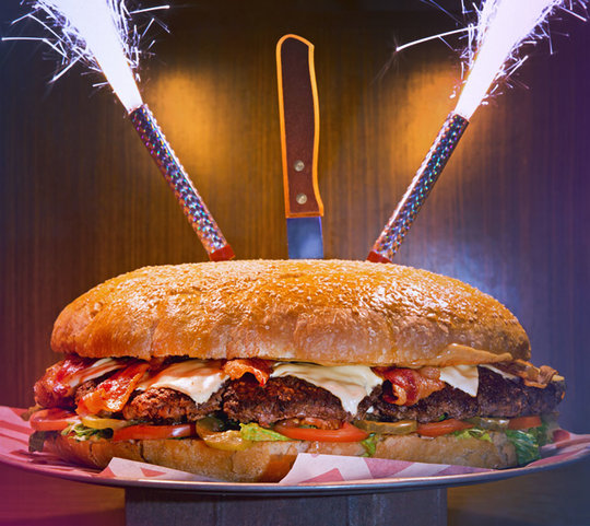 Six pound Behemoth burger with sparklers